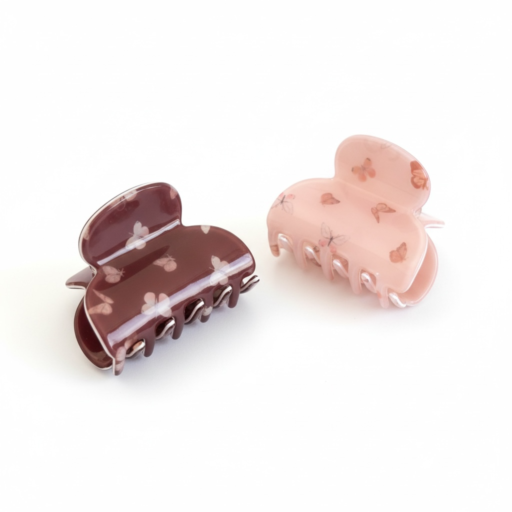 2- pack hårklämmor fjäril